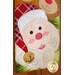 Close up of smiling Santa applique with rosy cheeks.