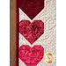 The pieced hearts in the A Year In Words Wall Hanging - February