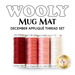 The coordinating 4 piece Applique thread set for the December Wooly Mug Mat