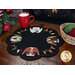 Adorable wool ugly sweater mat displayed on a wood table 