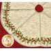 Holly-bordered tree skirt in cream with a red candy-striped binding.