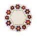 Isolated image of a white wool mat with small purple flowers