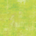 bright yellow-green grunge textured fabric