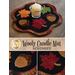 A collage of the November wool candle mat