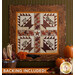 Beautiful autumn quilt with 4 blocks hanging on a green wall