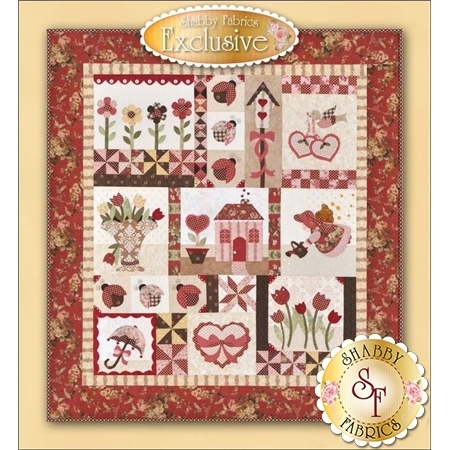 9 block spring quilt featuring flowers ladybugs cottage umbrella and angel in pastel pink and red