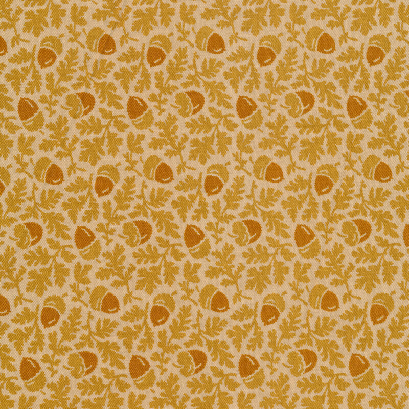 Fabric features tonal orange acorns and leaves tossed on a cream background | Shabby Fabrics
