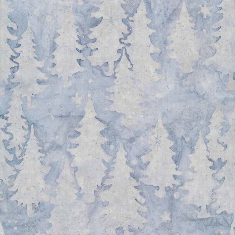 White and blue batik fabric with pine trees and metallic accents