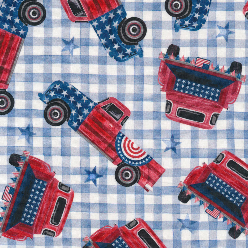 Tossed vintage trucks on a blue and white gingham background