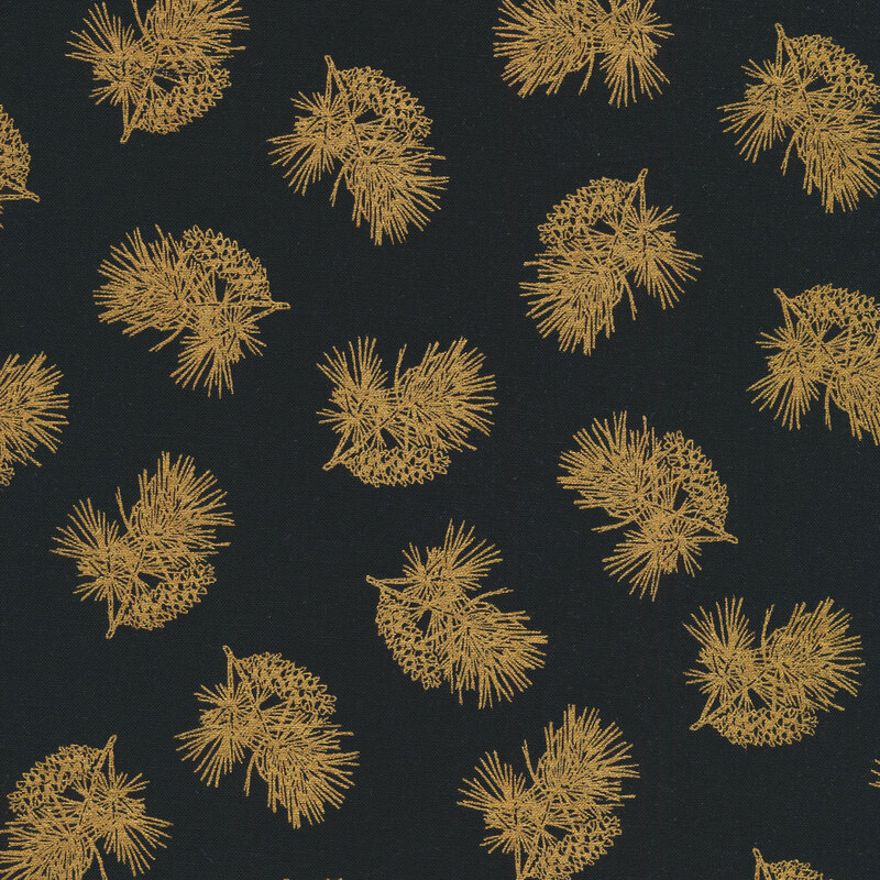 Tossed metallic evergreen and pine cones on a black background