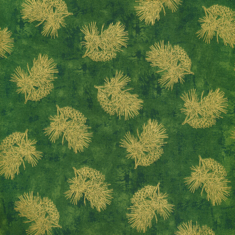 Tossed metallic evergreen and pine cones on a green background