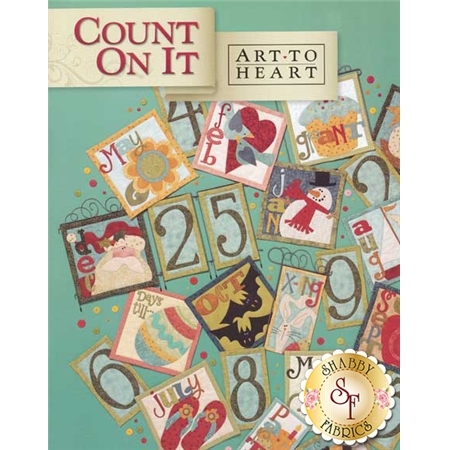 Front Cover of the Count On It Book by Art to Heart, featuring a variety of monthly wall hangings spread throughout the image.