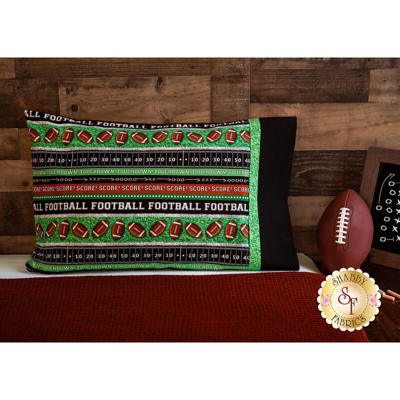 Football themed Magic Pillowcase displayed on a bed