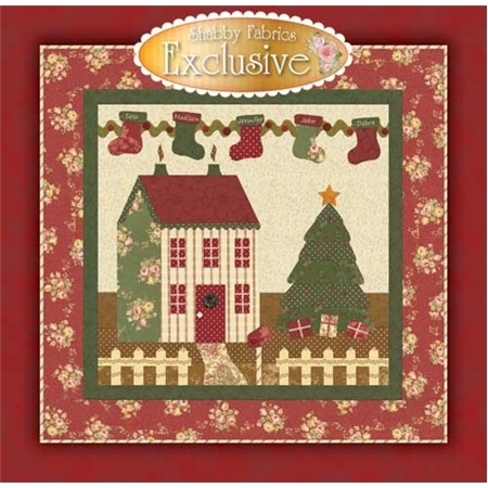 A green and cream cottage with a red roof. A string of five stockings embroidered with names on top.
