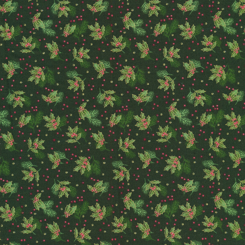 Tossed holly leaves on a green background
