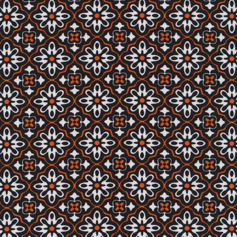 Geometric flower tiles on a black background