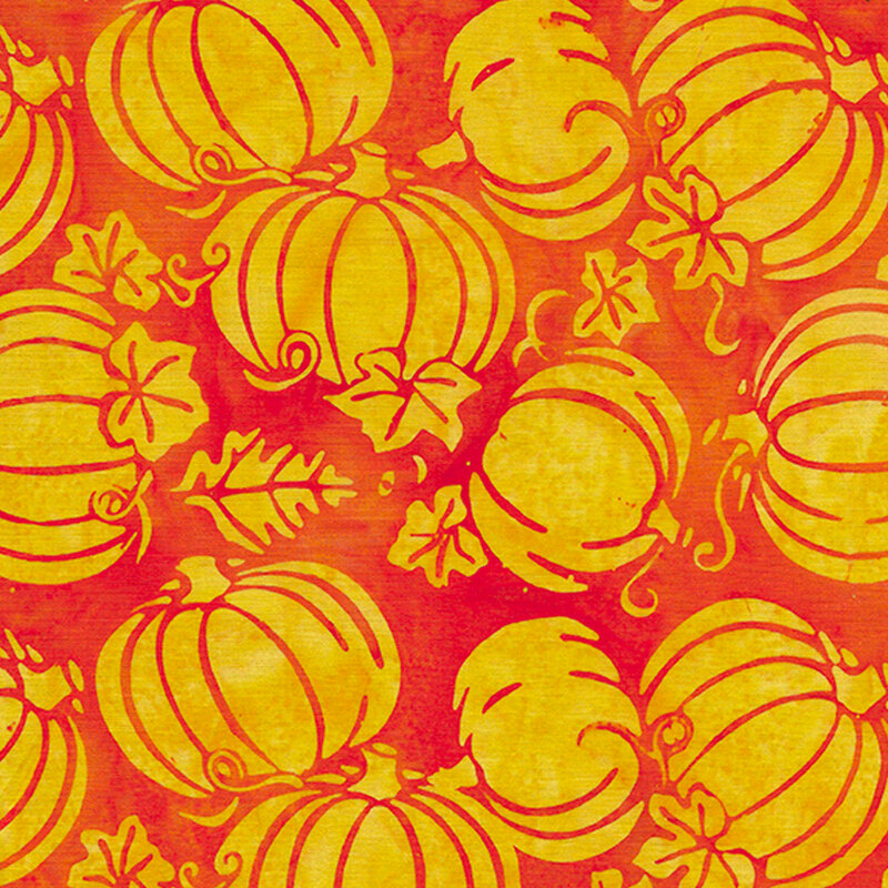 Tossed yellow pumpkins on an orange background