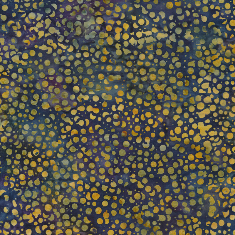 Mottled green and yellow dots on a mottled blue and purple background