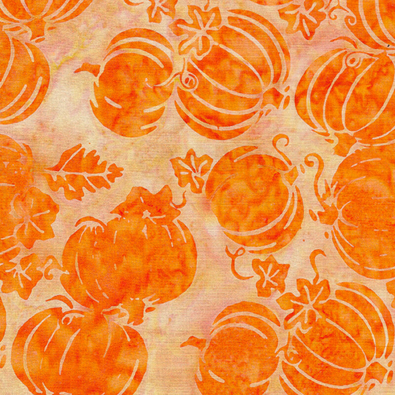 Tossed orange pumpkins on a mottled cream background