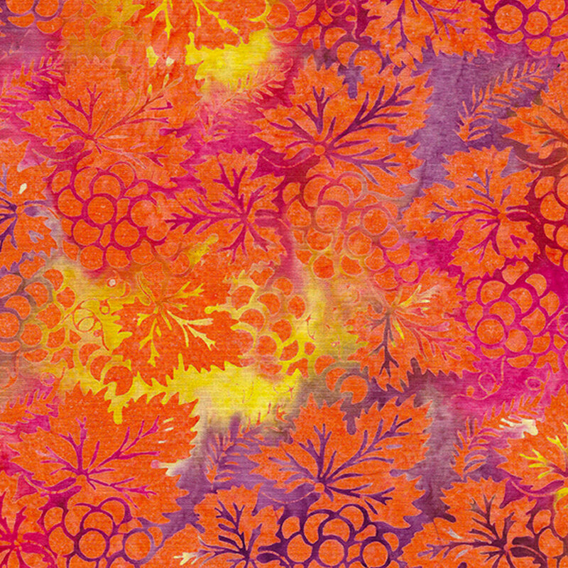 Orange grapes on a mottled sunset background