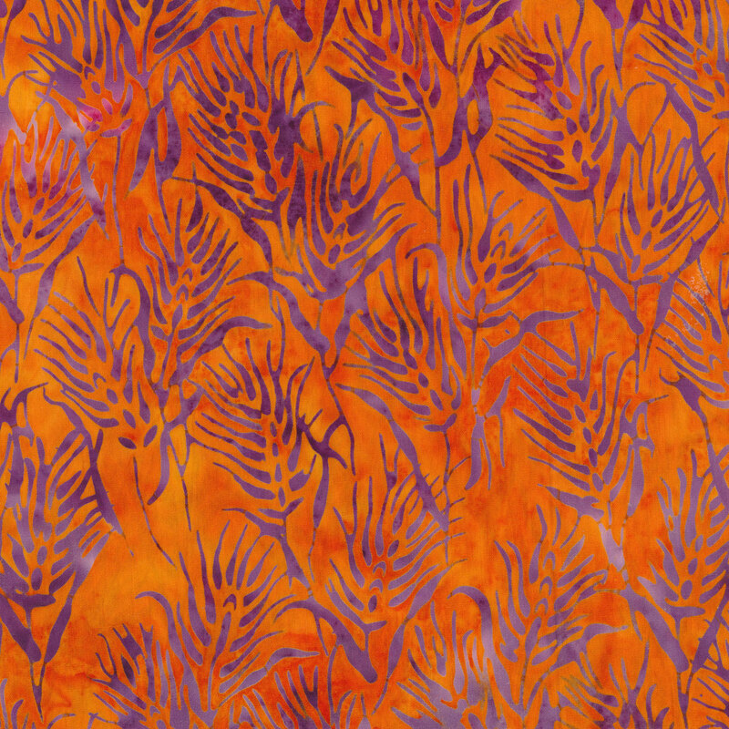 Mottled batik fabric with purple and pink heads of wheat on an orange background