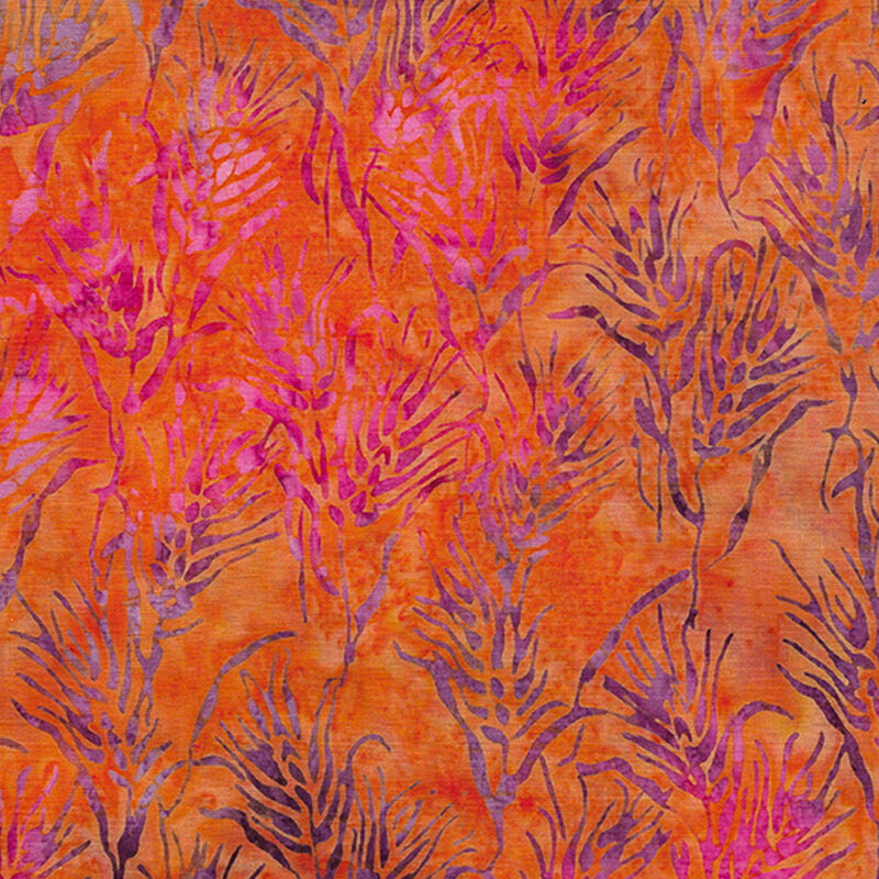 Heads of purple wheat on a mottled orange background
