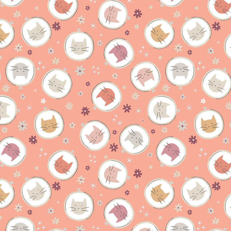 Circles with adorable cat faces on a pink background