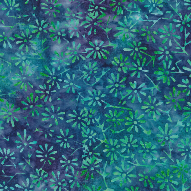 Mottled aqua flowers on a mottled blue background
