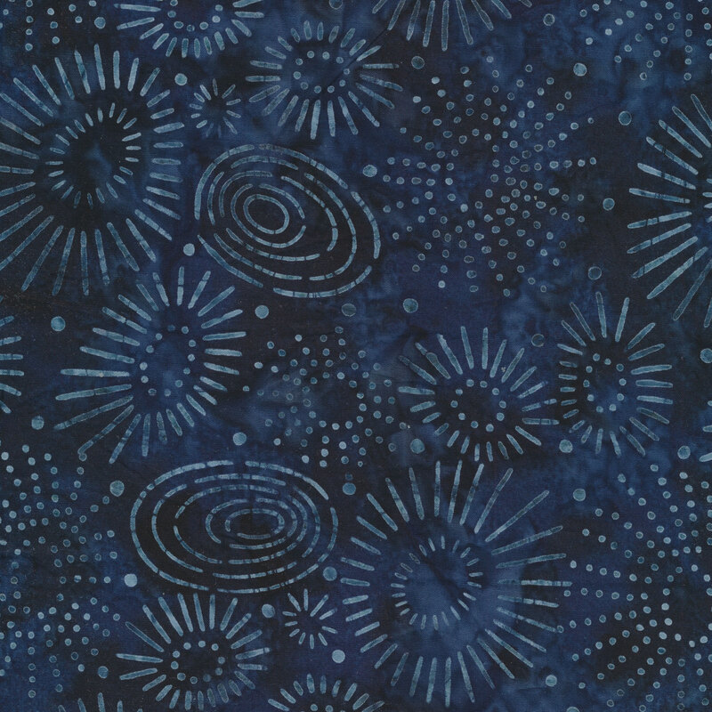 Circle designs on a mottled blue background
