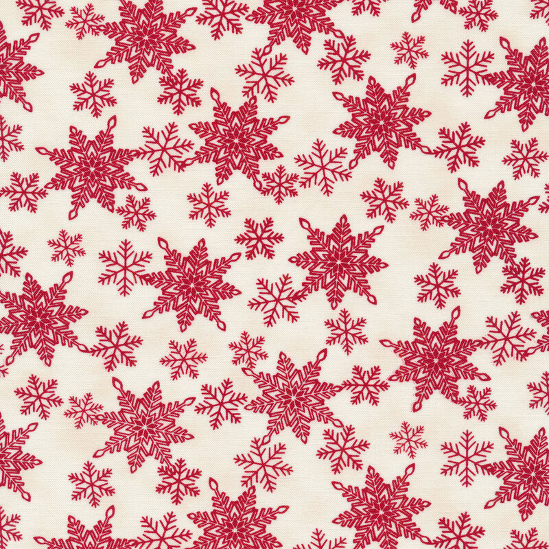 Red snowflakes all over a white background