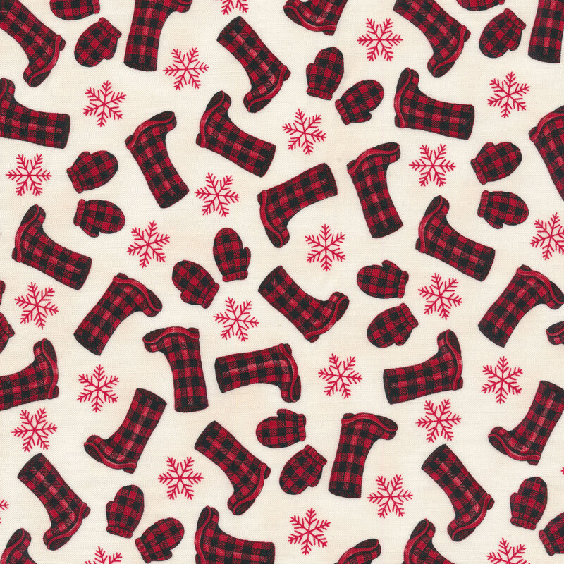 Tossed red and black plaid boots and mittens with snowflakes on a white background