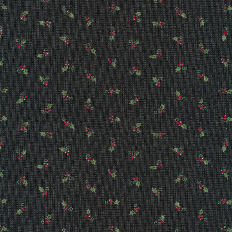 Tossed holly berries on a black burlap texture background