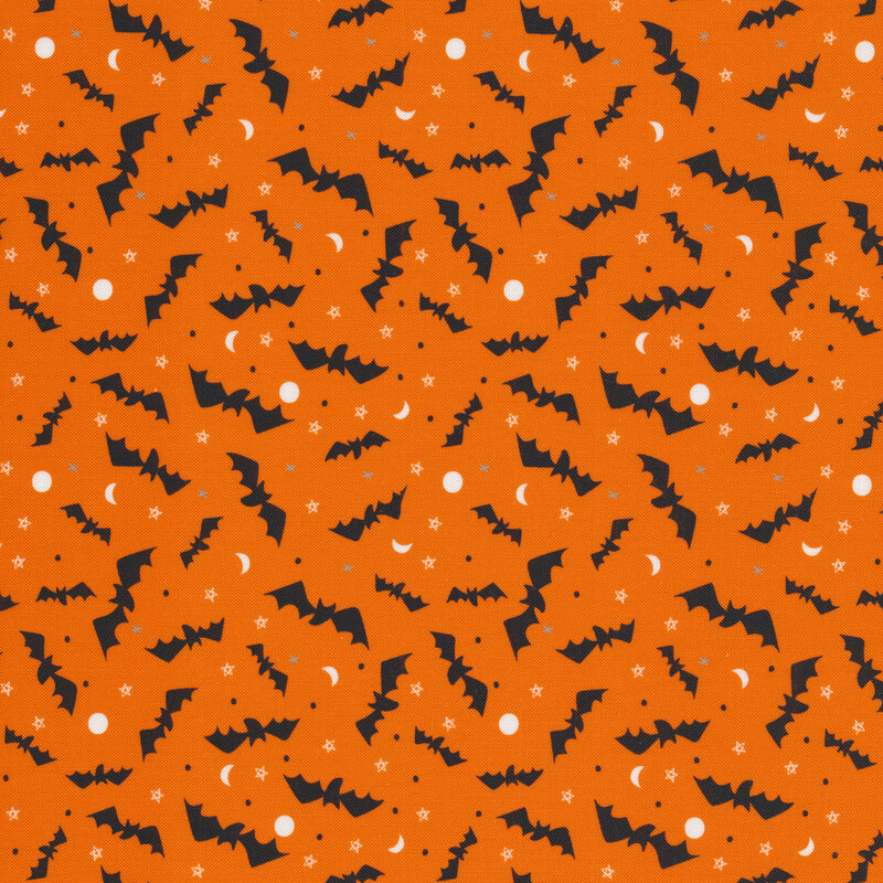 Flying bats on an orange background