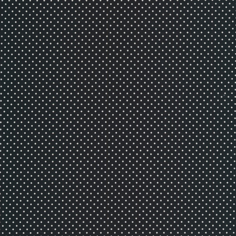 White polka dots on a black background