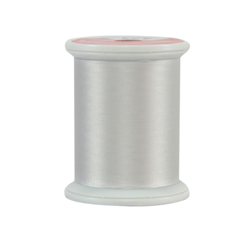 A spool of Kimono Silk Thread - 373 White Rice on a white background