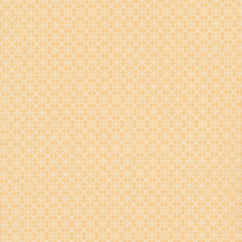 White ditsy print on a yellow background