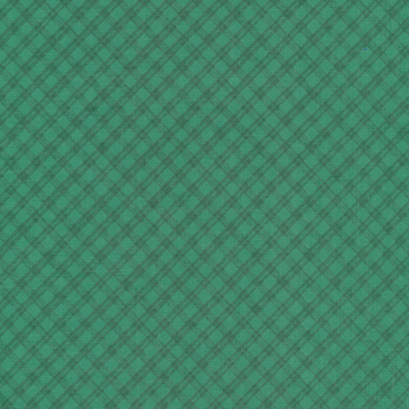 Tonal green plaid fabric