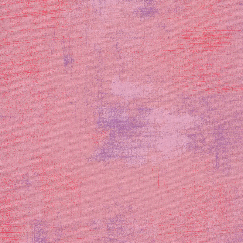 Pink and red grunge textured fabric
