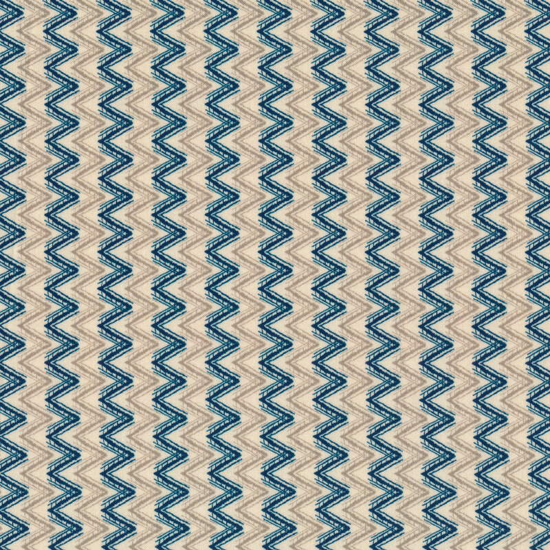 Blue and tan chevrons on a cream background