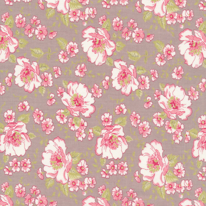 Pink and white flowers on a gray background