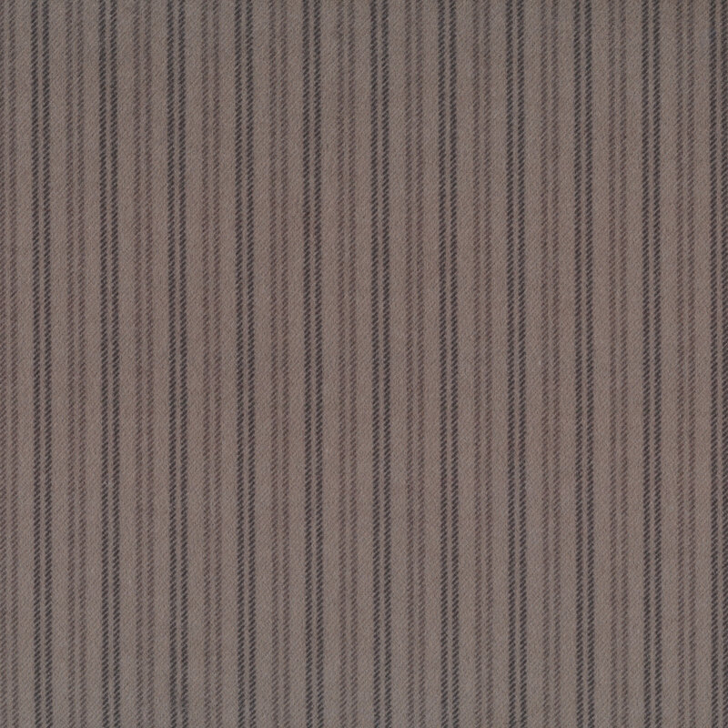 Small diagonal dashed lines on a taupe background