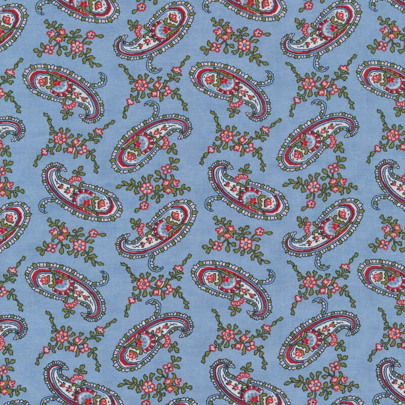 Tossed paisley and floral bunches on a light blue background