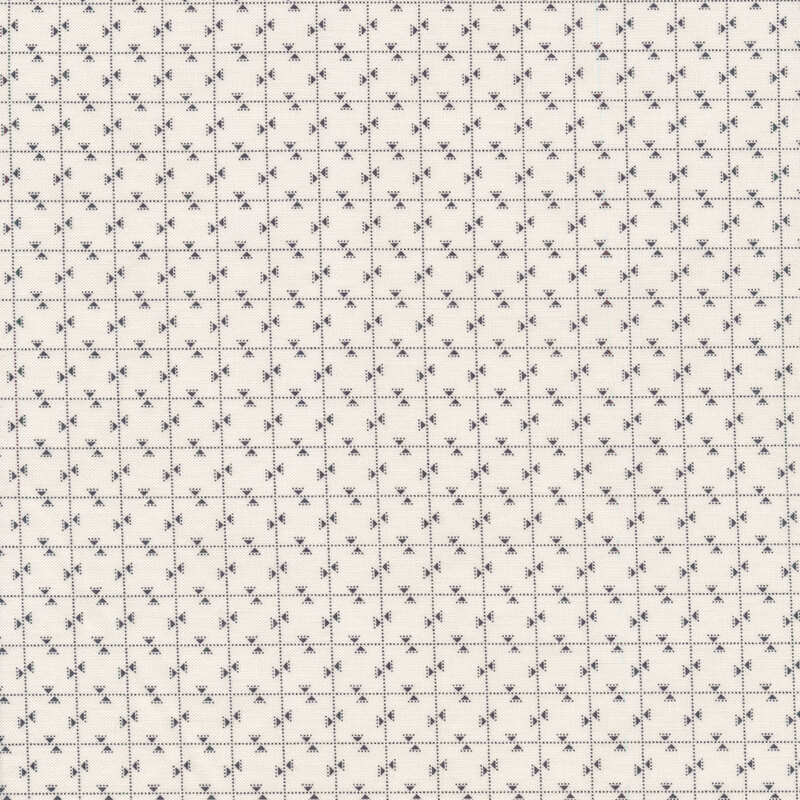 Cream fabric features tiny black triangle points on dotted checkboard shirting | Shabby Fabrics