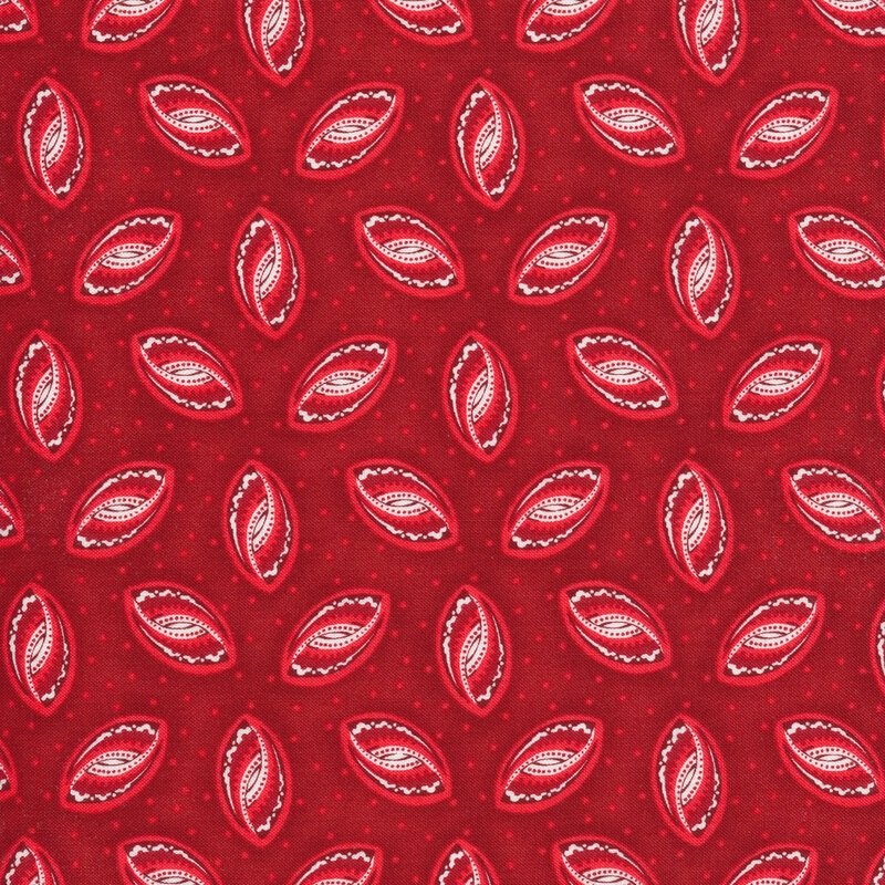 Red football shaped swirls on a red background
