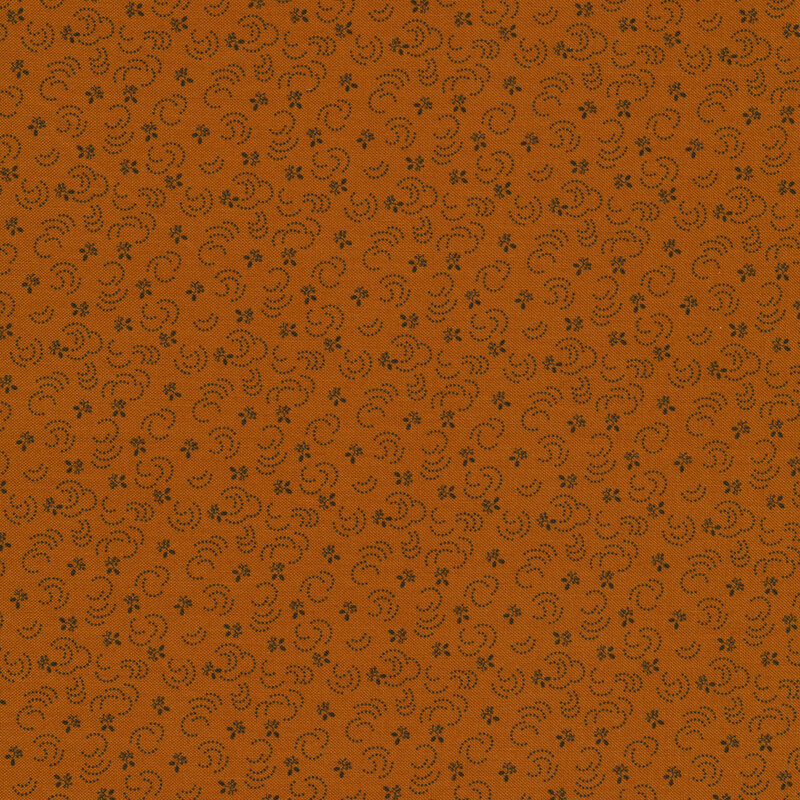 Fabric features tonal orange dotted circles and twigs pattern | Shabby Fabrics