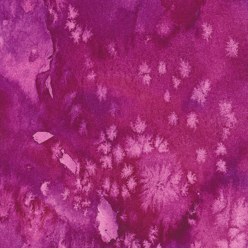 Mottled magenta fabric with a watercolor style