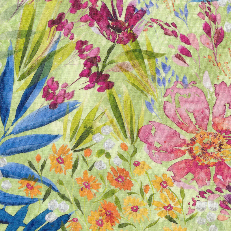 multicolor flowers and leaves on a mottled green fabric background