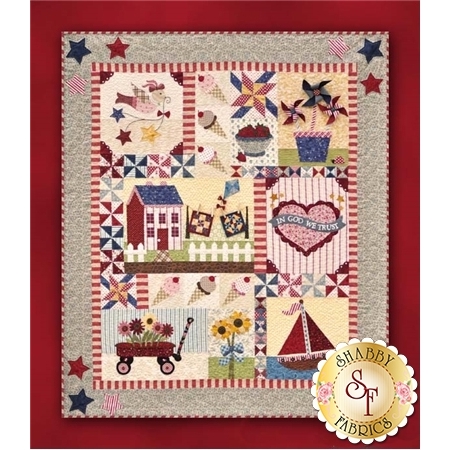 9 block summer quilt with summer motifs including a wagon, ice cream cones, pinwheels, sailboat, sunflowers, and a cottage with mini quilts.