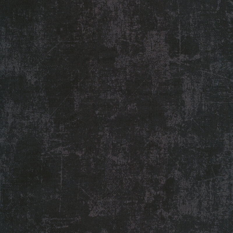 A mottled black fabric with charcoal cracked texturing