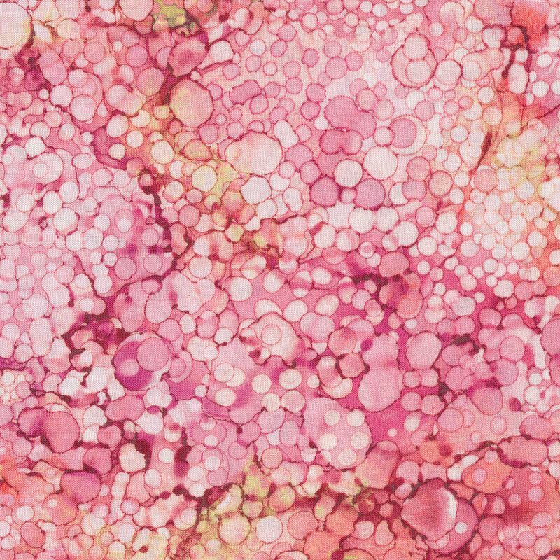 Light pink and magenta marbled fabric with small dots all over